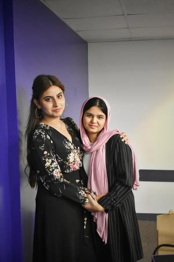Alina Asif with a new student at a meet and greet